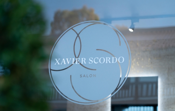Xavier Scordo salon window logo