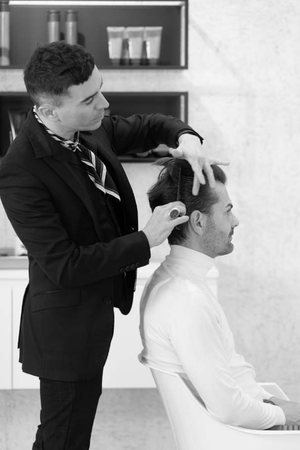 Xavier Scordo cutting hair